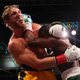 Floyd Mayweather exchanges blows with Logan Paul during their contracted exhibition boxing match at Hard Rock Stadium on June 06, 2021 in Miami Gardens, Florida.